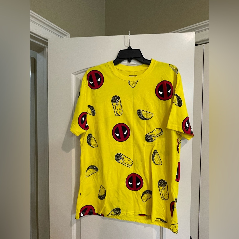 Deadpool tee. New without tags.  Smoke free home. Size large.